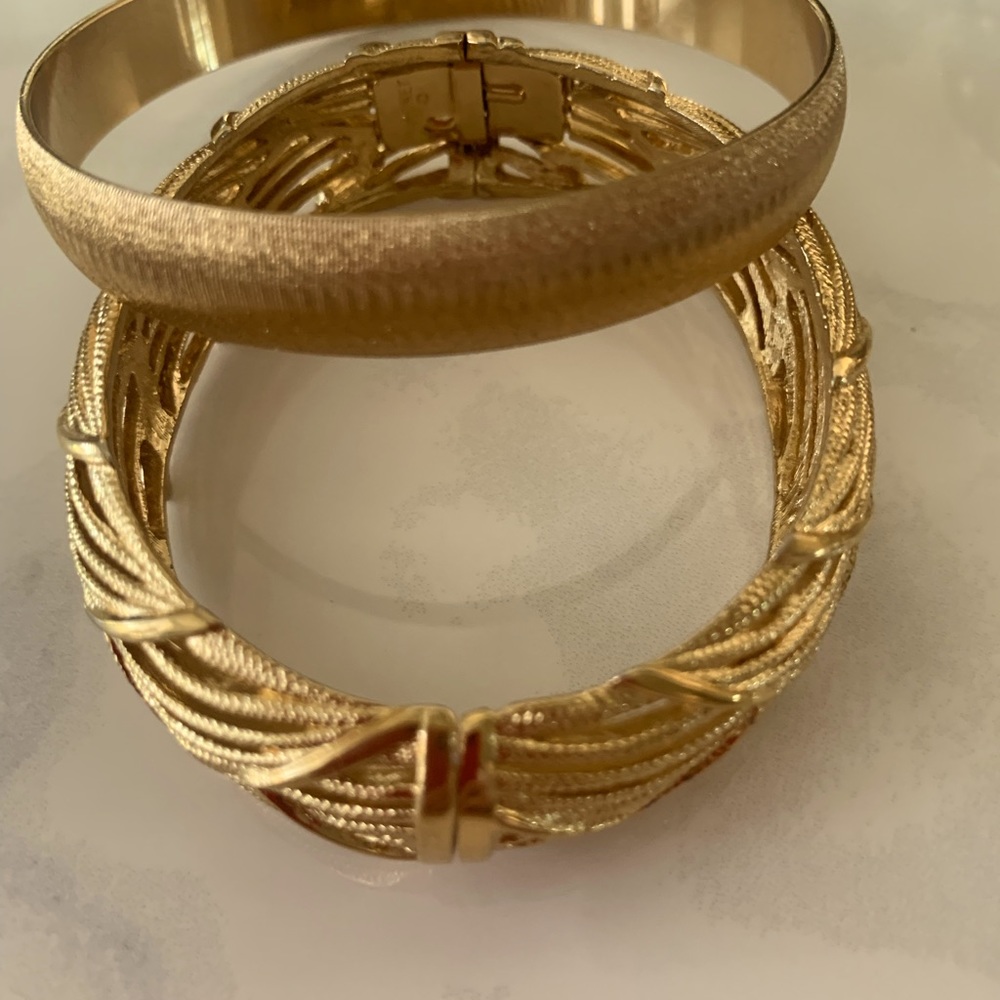 Gold bangles by Monet